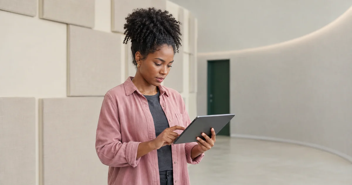 A SaaS localisation specialist testing a product flow on a tablet